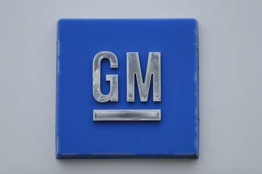 A GM logo is shown at the General Motors Detroit-Hamtramck Assembly plant in Hamtramck, Mich