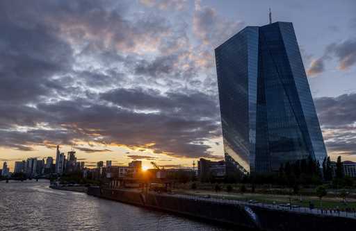 The sun sets next to the European Central Bank in Frankfurt, Germany, Monday, July 24, 2023