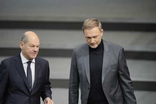 German Chancellor Olaf Scholz, left, and German Finance Minister Christian Lindner arrive for the d…
