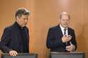 German Chancellor Olaf Scholz, right, and Economy and Climate Minister Robert Habeck, left, attend …