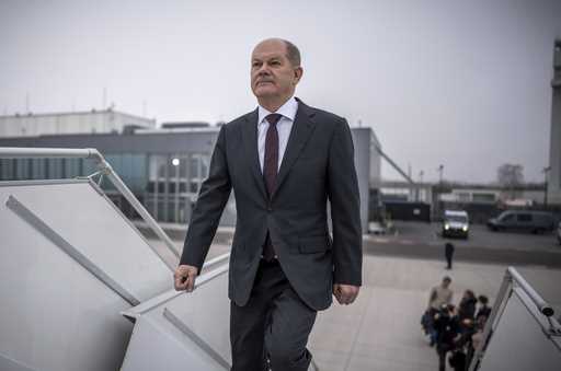 German Chancellor Olaf Scholz boards a plane at the military section of Berlin Brandenburg Airport …