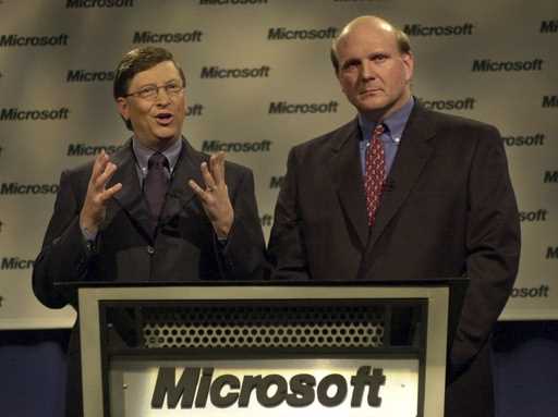 Microsoft chairman Bill Gates, left, and president and CEO Steve Ballmer speak at a news conference…