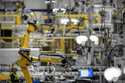 Articulated robots move inside the Hanwha Qcells Solar plant, October 16, 2023, in Dalton, Ga