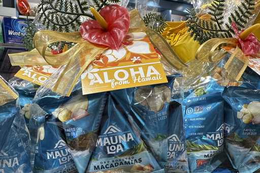 Packages of macadamia nuts are displayed on store shelves on Friday, April 26, 2024, in Honolulu