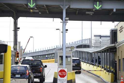 Motorists pay toll at Gateway International Bridge, March 6, 2023, in Brownsville, Texas, to cross …
