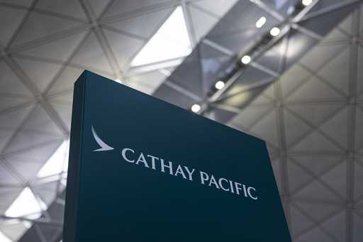 A signage for Cathay Pacific Airways at the departures hall of Hong Kong International Airport in H…