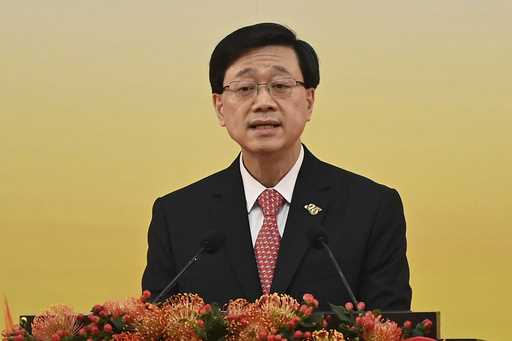 FILE- Hong Kong's Chief Executive John Lee gives a speech following a swearing-in ceremony to inaug…