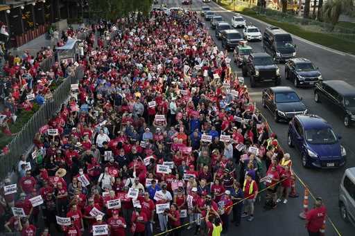 Members of the Culinary Workers Union rally along the Las Vegas Strip, August 10, 2023, in Las Vega…