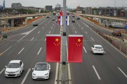 Chinese and Serbian flags fly on lampposts, days before the visit of Chinese President Xi Jinping i…