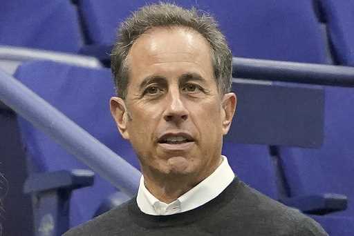 Jerry Seinfeld is shown before the men's singles final of the U