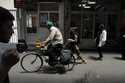People make their way through the old main bazaar of Tehran, Iran, Thursday, June 13, 2024