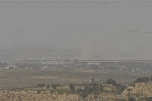 A screenshot taken from AP video showing a general view of northern Gaza as seen from Southern Isra…