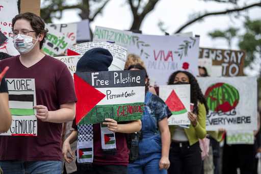 Texas A&M students and members of Texas A&M Young Democratic Socialists of America participate in a…