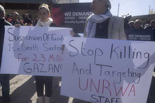 Palestinians protest against the suspension of funds from several donor countries to the United Nat…