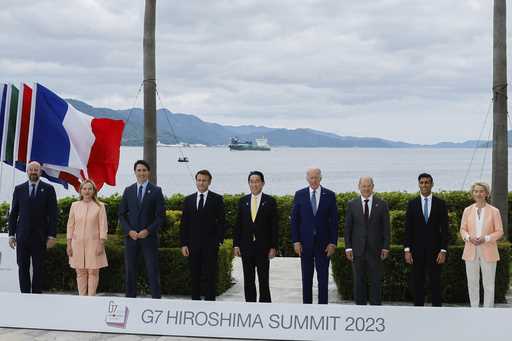 From left, European Council President Charles Michel, Italian Premier Giorgia Meloni, Canada's Prim…