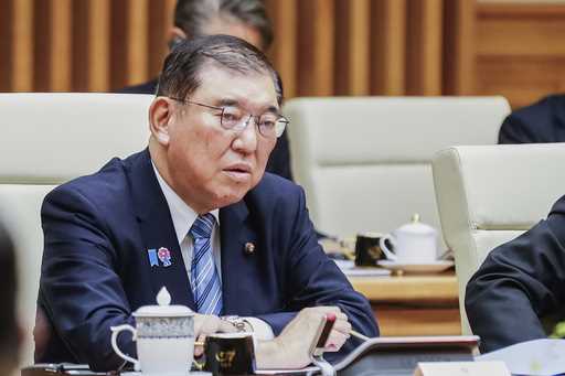 Japanese Prime Minister Shigeru Ishiba speaks during a meeting at the Government Office in Hanoi, V…