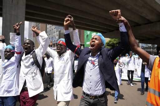 Doctors and other medical staff take part in a protest, in downtown Nairobi, Kenya, Tuesday, April …