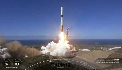 In this image from video provided by SpaceX, South Korea launches its first military spy satellite …
