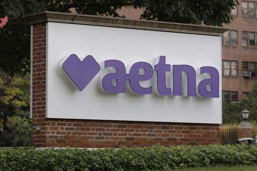 A sign sits on the campus of the insurance and managed health care company Aetna, August 28, 2020, …