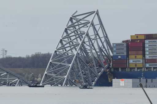 Parts of the Francis Scott Key Bridge remain after a container ship collided with one of the bridge…