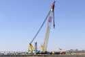 A crane is seen near the wreckage of the Francis Scott Key Bridge on Friday, March 29, 2024 in Balt…
