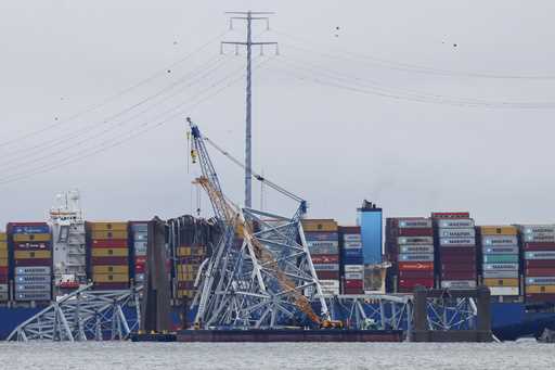 Salvage work continues on the collapsed Francis Scott Key Bridge, Tuesday, April 2, 2024, in Baltim…