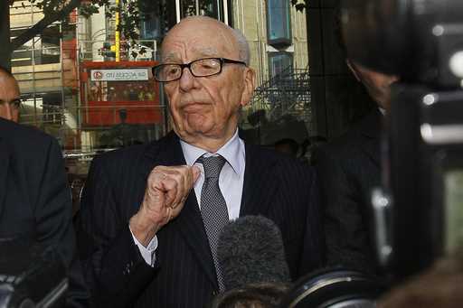 Rupert Murdoch talks with the media in London, July 15, 2011