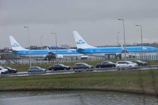 KLM airplanes sit in Schiphol Airport near Amsterdam, Netherlands, on January 18, 2018