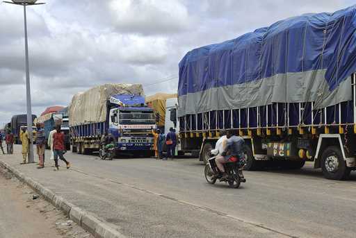 Stranded trucks with goods are seen at the border between Nigeria and Niger in Jibia, Nigeria, Mond…