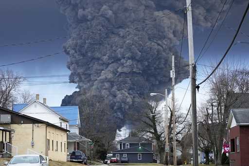 A black plume rises over East Palestine, Ohio, as a result of a controlled detonation of a portion …