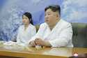 In this photo provided by the North Korean government, North Korean leader, Kim Jong Un, right, and…