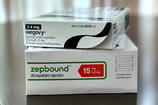 Boxes for the medications Wegovy and Zepbound are arranged for a photograph in California on Thursd…