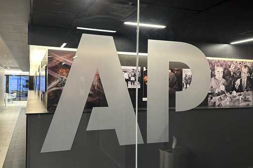 The Associated Press logo is displayed at the news organization's world headquarters in New York on…