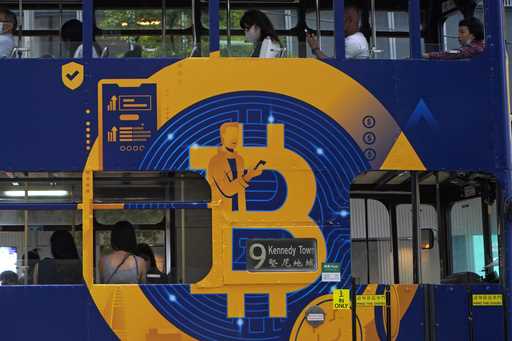 An advertisement for the cryptocurrency Bitcoin displayed on a tram, May 12, 2021, in Hong Kong