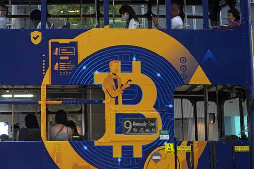 An advertisement for the cryptocurrency Bitcoin displayed on a tram, May 12, 2021, in Hong Kong