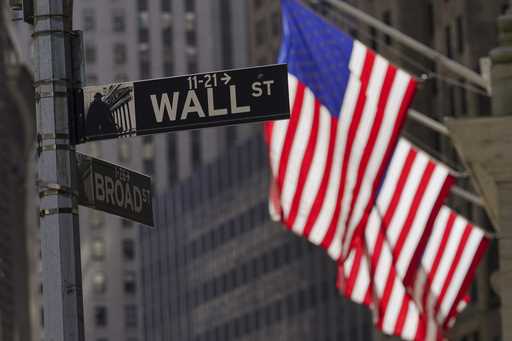 American flags fly outside the New York Stock Exchange, Friday, Sept