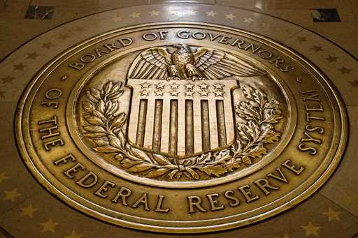 The seal of the Board of Governors of the United States Federal Reserve System is displayed, Februa…