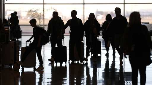 People pass through Salt Lake City International Airport Wednesday, January 11, 2023, in Salt Lake …