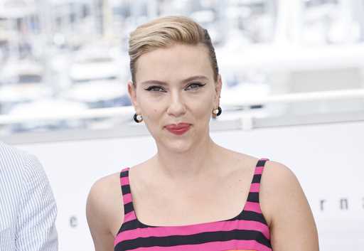 Scarlett Johansson poses for photographers at the photo call for the film 