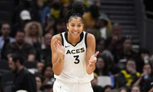 Las Vegas Aces forward Candace Parker reacts during the first half of a WNBA basketball game agains…