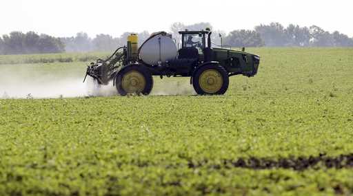 A soybean field is sprayed in Iowa, July 11, 2013