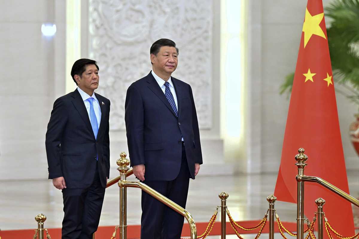 Philippine leader cites stable ties on visit to Beijing