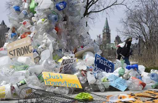 A person walks past an art installation outside a United Nations conference on plastics on April 23…