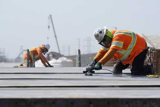 Ironworkers with the California High-Speed Rail Authority work on the Hanford Viaduct, April 15, 20…