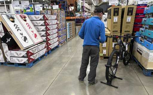 A shopper peruses a mountain bicycle on display in a Costco warehouse Wednesday, May 10, 2023, in S…