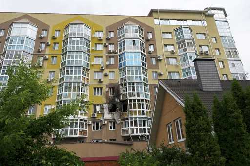 Broken windows and traces of fire are seen after a drone fell at a residential building in Voronezh…