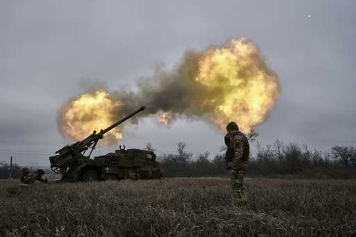 Ukrainian soldiers fire a French-made CAESAR self-propelled howitzer towards Russian positions near…