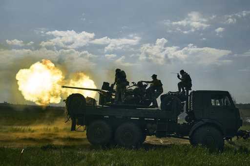 Ukrainian soldiers fire a cannon near Bakhmut, an eastern city where fierce battles against Russian…