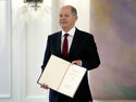 Scholz replaces Merkel as German chancellor, opening new era
