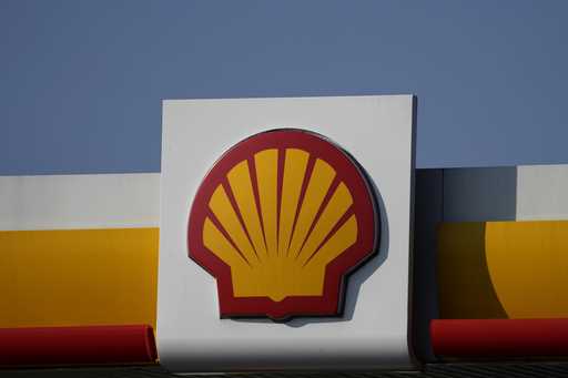 A Shell logo is displayed at a gas station in London, on March 8, 2022